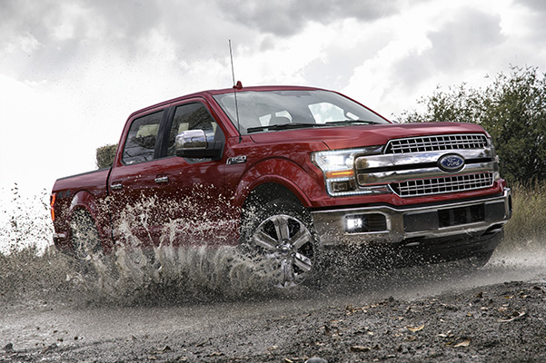 2020 Ford F-150 driving through mud in storm