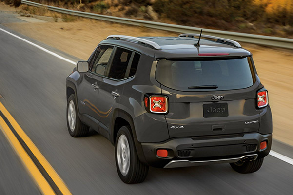 Jeep Renegade driving on road
