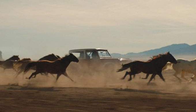 Ford bronco driving on an off road trail while enjoying the wilderness