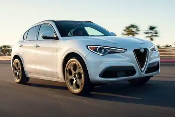 A 2021 Alfa Romeo Stelvio being driven on a track.