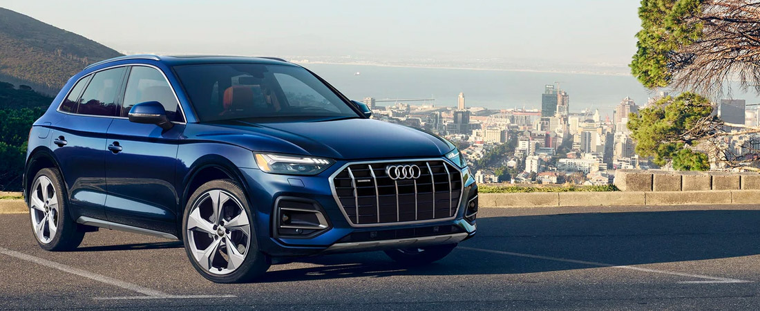 2021 Audi Q5 parked in a lot with a scenic overlook