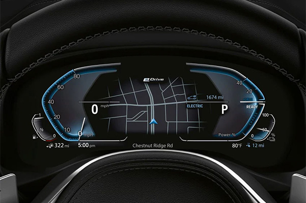 Charge status, full-electric or combined driving ranges, electric motor output, and more shown on the steering wheel display