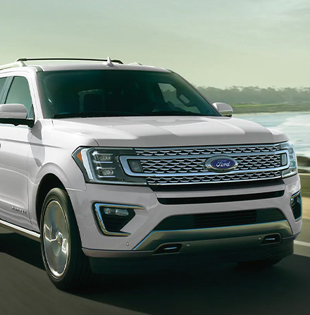 2021 Ford Expedition driving along the ocean