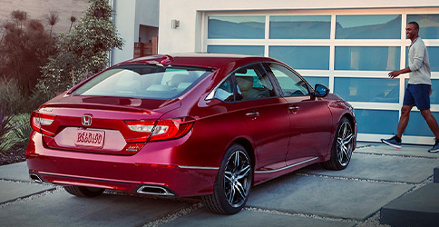 Rear view shot of the 2021 Honda Accord parked in the driveway
