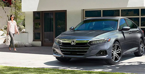 Front view shot of the 2021 Honda Accord  parked in the driveway