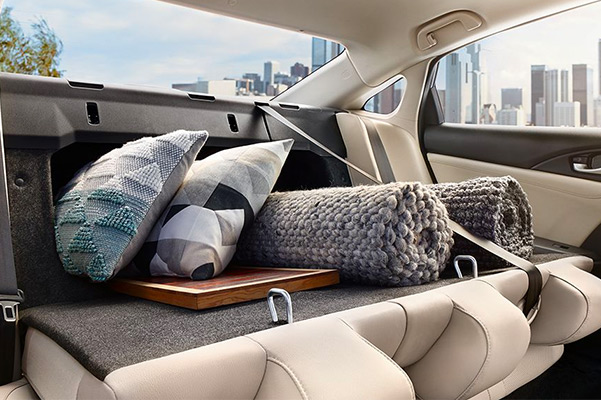 The 60/40 split fold-down rear seatback folds down to reveal a sizable pass-through for those extra-large items