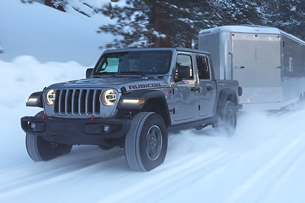 2021 Jeep Gladiator towing through snow