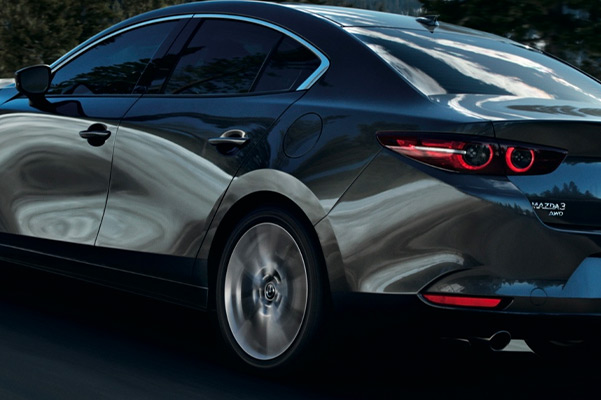 Rear view close up of a 2021 Mazda3 in motion