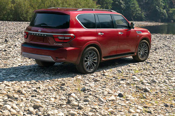 Rear shot of the 2021 Nissan Armada parked off road