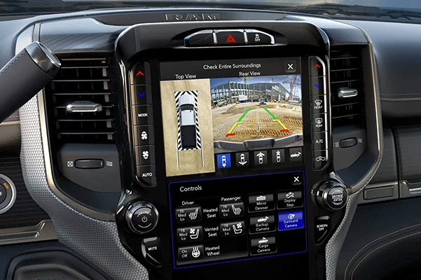 Display The Surround View Camera displaying the trailer reverse guidance view on the Uconnect touchscreen in the 2021 Ram 2500.