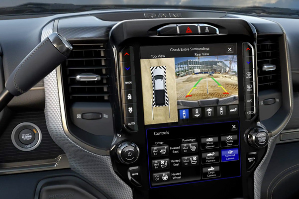 Display The Surround View Camera displaying the trailer reverse guidance view on the Uconnect touchscreen in the 2021 Ram 2500.