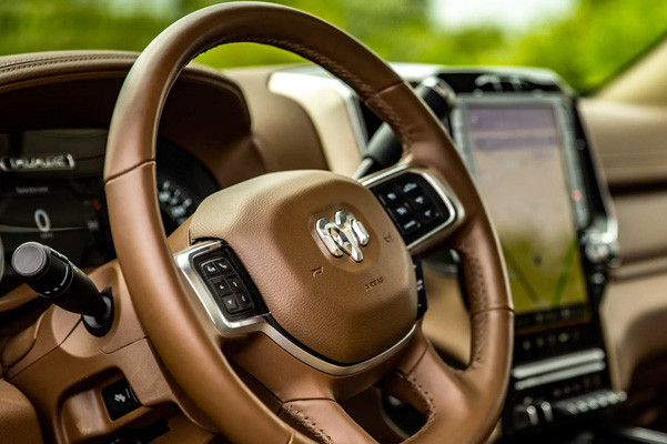 A close-up of the steering wheel in the 2021 Ram 3500.