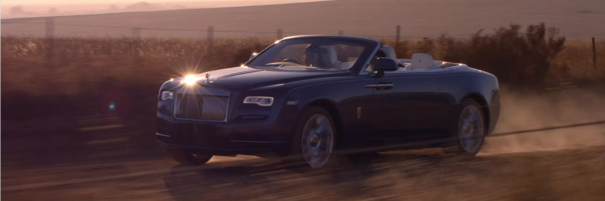 A 2021 Rolls-Royce Dawn driving in the desert