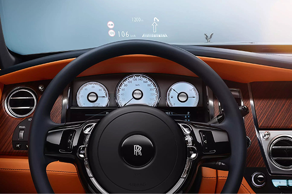 Interior shot of a 2021 Rolls-Royce Dawn steering wheel
