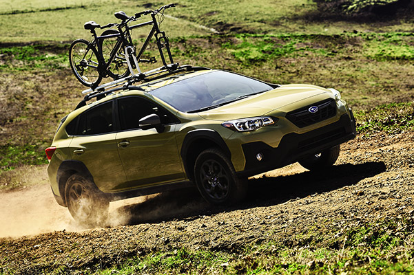 A 2021 Subaru Crosstrek Sport on a dirt road.