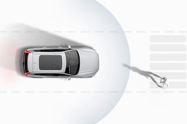 safety illustration of driver assist features in the 2021 Volvo S60 showing a pedestrian at a crosswalk