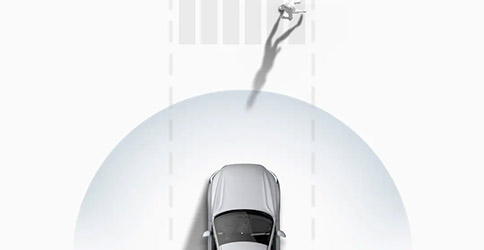 Safety assistance on a 2021 Volvo XC40 detecting a person in the crosswalk ahead