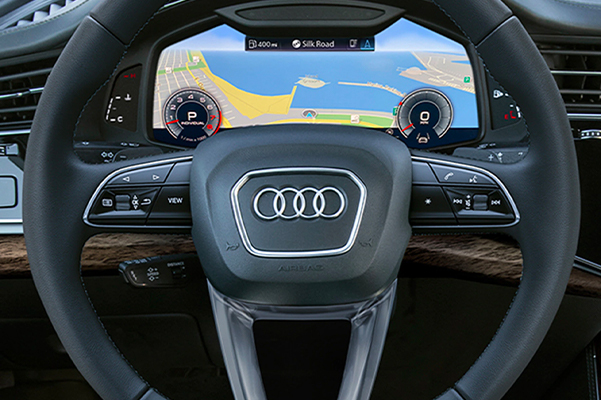 Detail shot of a 2022 Audi Q7 steering wheel.