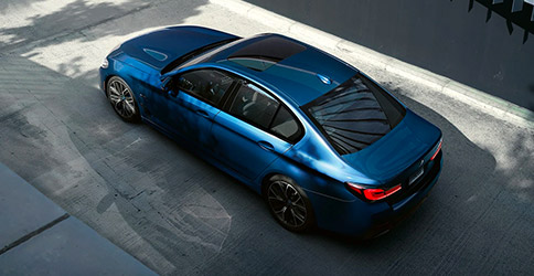 2022 BMW 5 Series top view parked on street