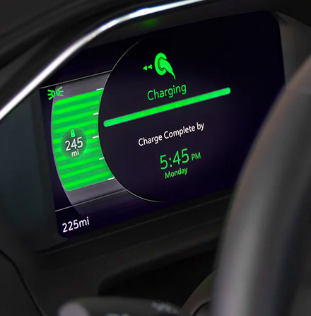 Steering wheel dash displaying charging information