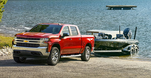 2022 Chevrolet Silverado LTD Pickup Truck Towing Boat out of Water