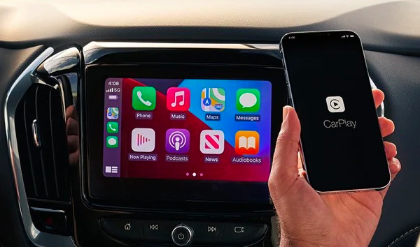 Passenger Using In-Vehicle Apple CarPlay