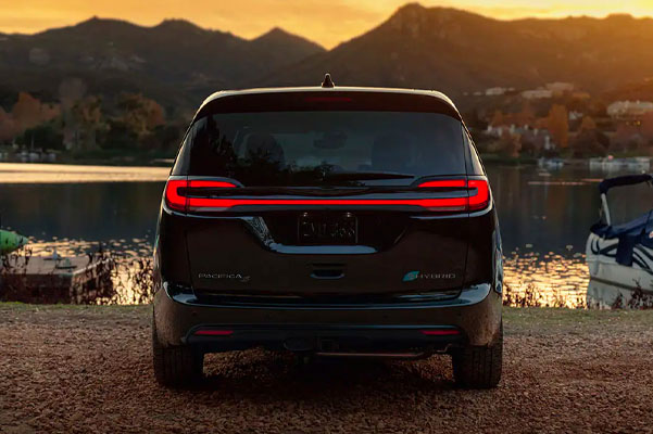 rearview shot of the 2022 Chrysler Pacifica Hybrid with mountains in the background