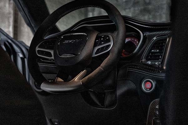 View of the steering wheel on the 2022 Dodge Challenger SRT® Hellcat Redeye.