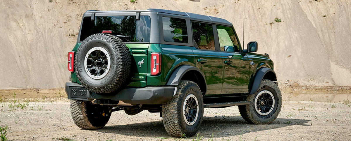 2022 Ford Bronco™ in Eruption Green Metallic parked in the desert