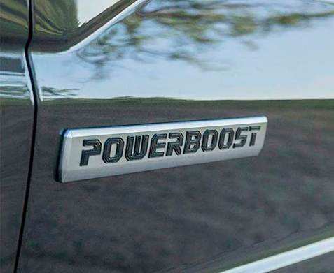 A close-up of a 2022 Ford F-150® Powerboost™ badge