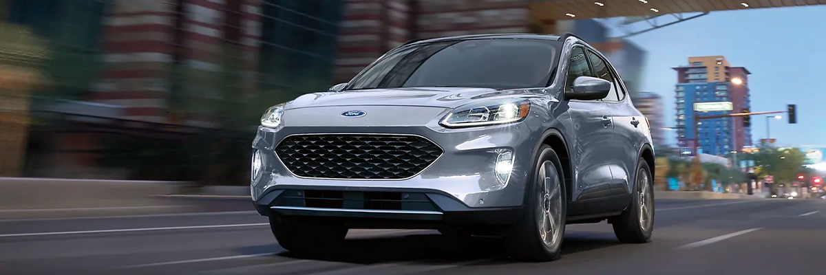 2022 Ford Escape Titanium Hybrid in Iced Blue Silver Metallic with distinctive black mesh grille