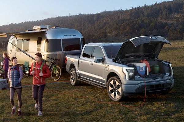 A 2022 Ford® F-150 Lightning at camp site