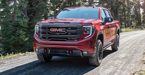 Front view of 2022 GMC Sierra 1500 driving on the road