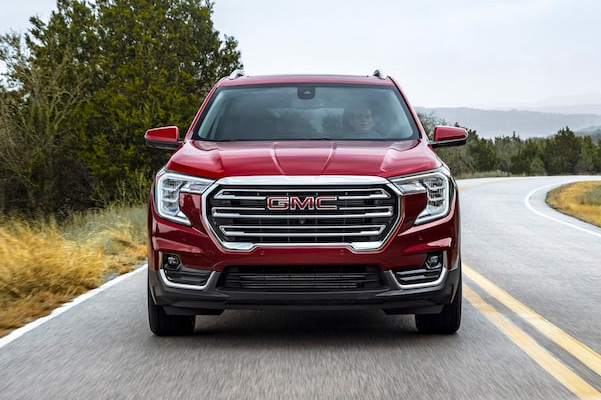 2022 GMC Terrain SLE/SLT Small SUV Driving on Road - Front Grille View