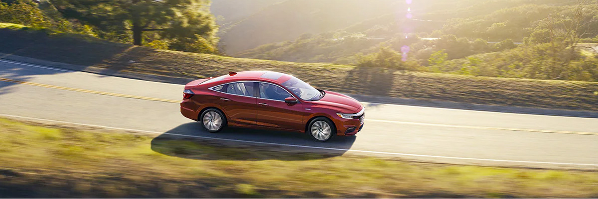 Touring shown in Radiant Red Metallic