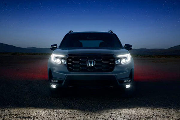 Elite shown in Sonic Gray Pearl.* LED headlights with auto-on/off standard on TrailSport and Elite. LED headlights with auto-on/off can turn on low beams or high beams automatically, illuminating the road ahead.

