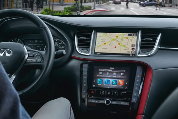2022 INFINITI QX55 interior highlighting steering wheel & INFINITI InTouch connectivity