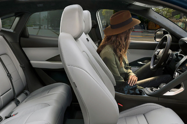 Woman Sitting in Jaguar E-PACE Drivers Seat