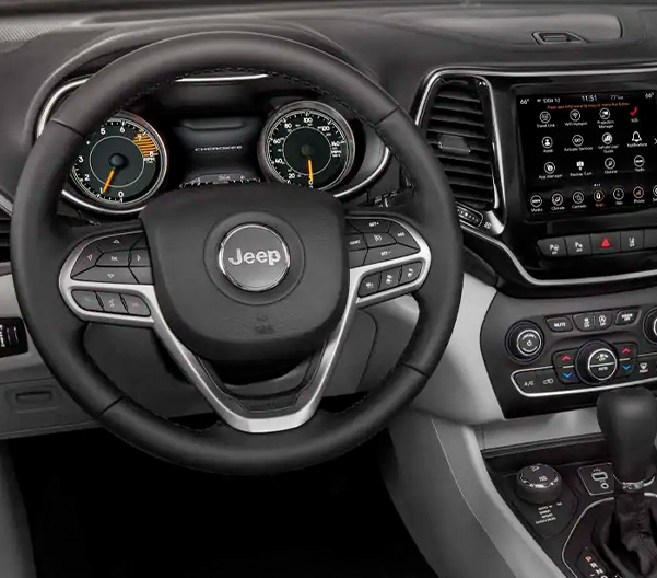 Display The view from the driver's seat in the 2022 Jeep Cherokee Limited, with the steering wheel front and center.