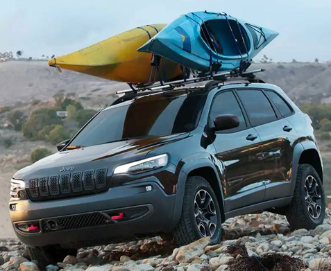 The 2022 Grand Jeep Cherokee hauling kayaks
