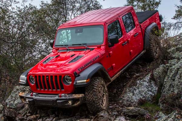 The 2022 Jeep Gladiator Rubicon descending a steep, rocky slope.