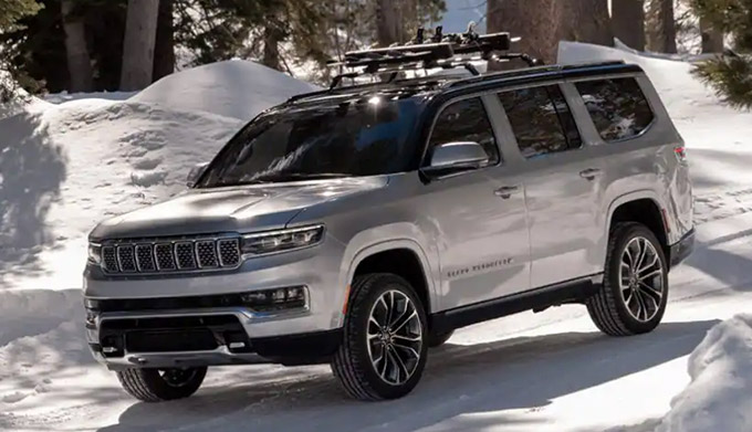 2022 Jeep Grand Wagoneer driving on snowy road