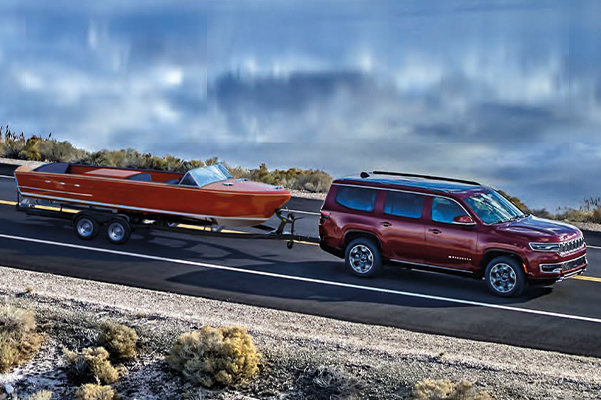 Jeep Wagoneer towing a boat
