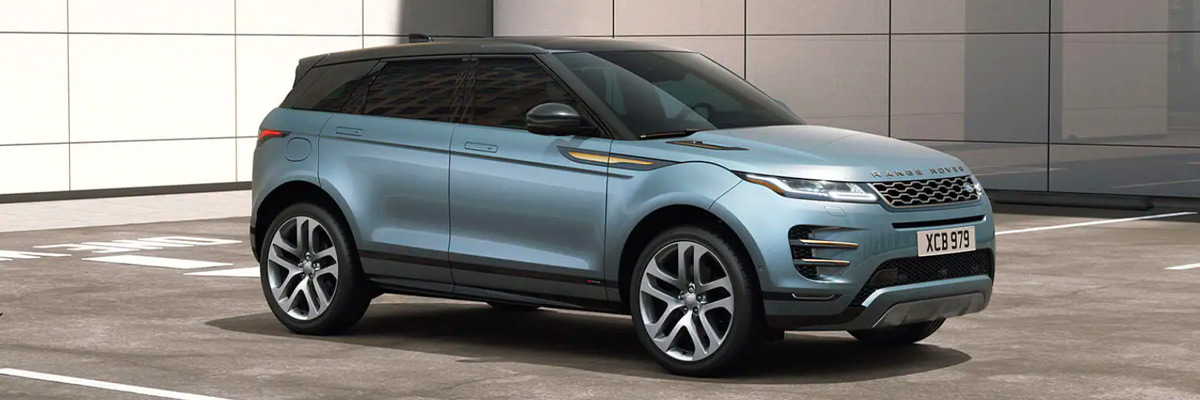Exterior shot of a 2022 Range Rover Evoque parked in an empty lot.