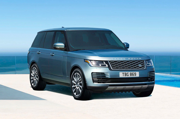Exterior shot of a 2022 Range Rover parked with an ocean in the background.