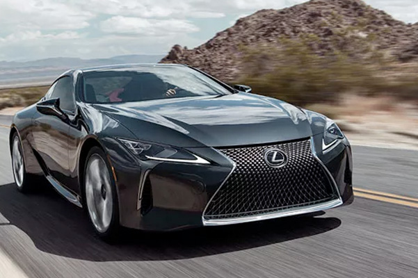 Exterior of the Lexus LC shown in Caviar while driving.