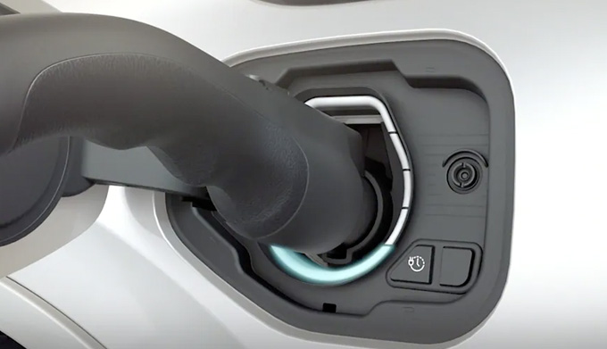 An animation of a charge port illuminating as a Lincoln hybrid electric vehicle charges is shown