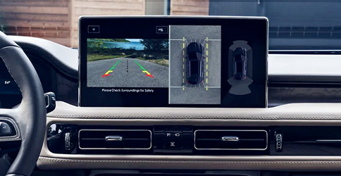 The Rear View Camera and 360-Degree Camera views are displayed on the center touchscreen inside a 2022 Lincoln Nautilus