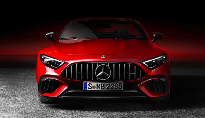 Front exterior shot of a 2022 Mercedes-Benz AMG SL parked in a dark studio.