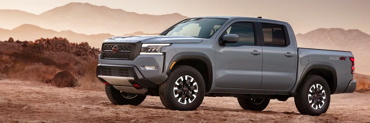 Nissan Frontier parked in desert mountain area 